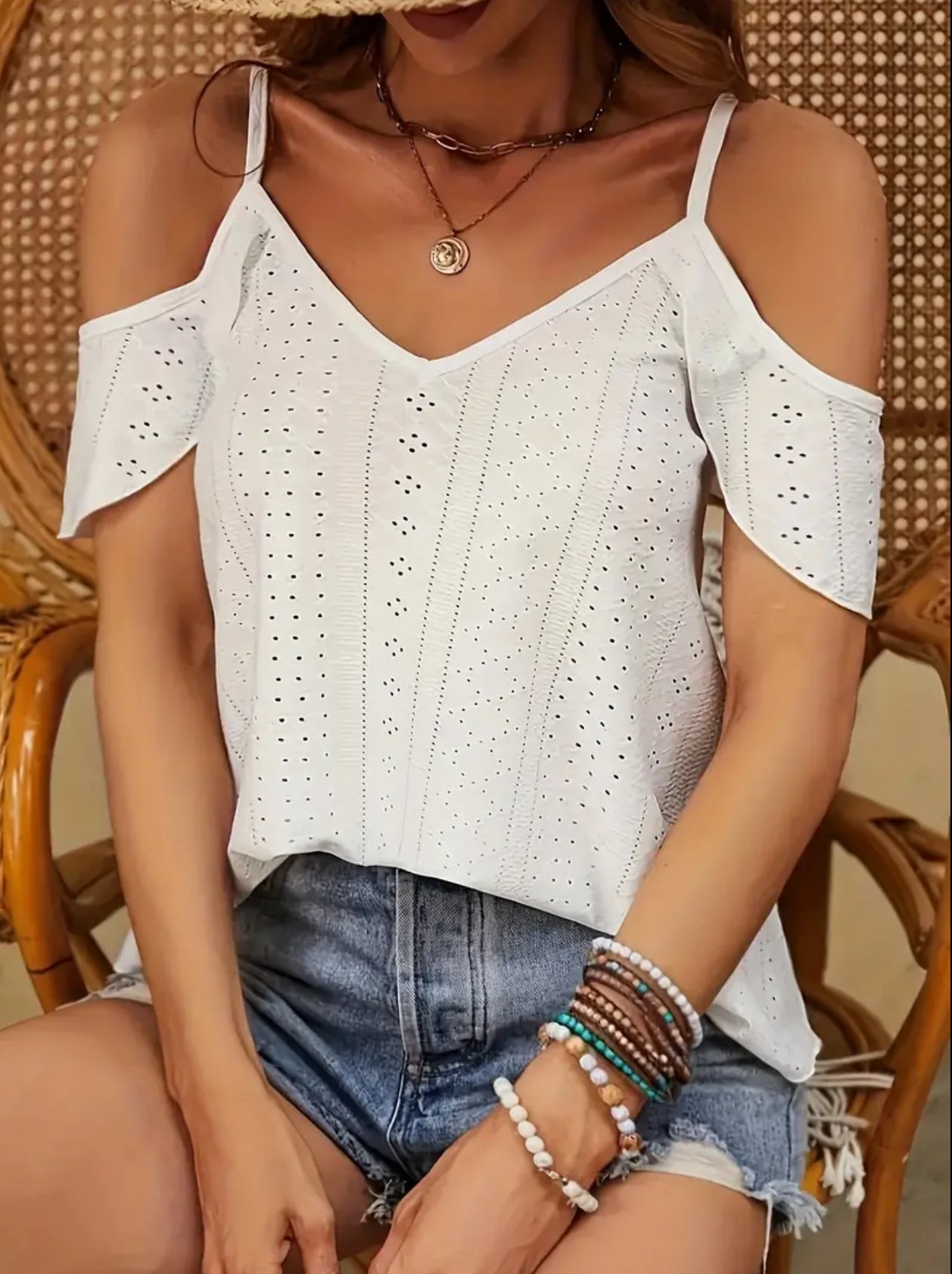 Women’s Cold shoulder ruffle sleeve v-neck shirt.