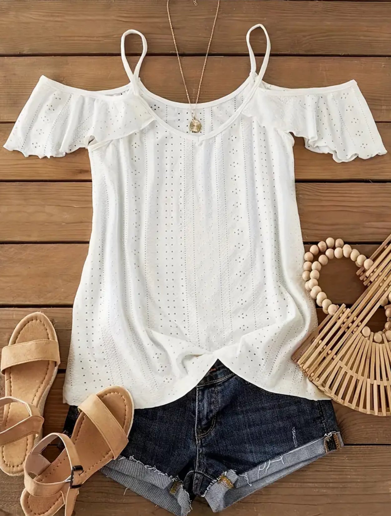 Women’s Cold shoulder ruffle sleeve v-neck shirt.